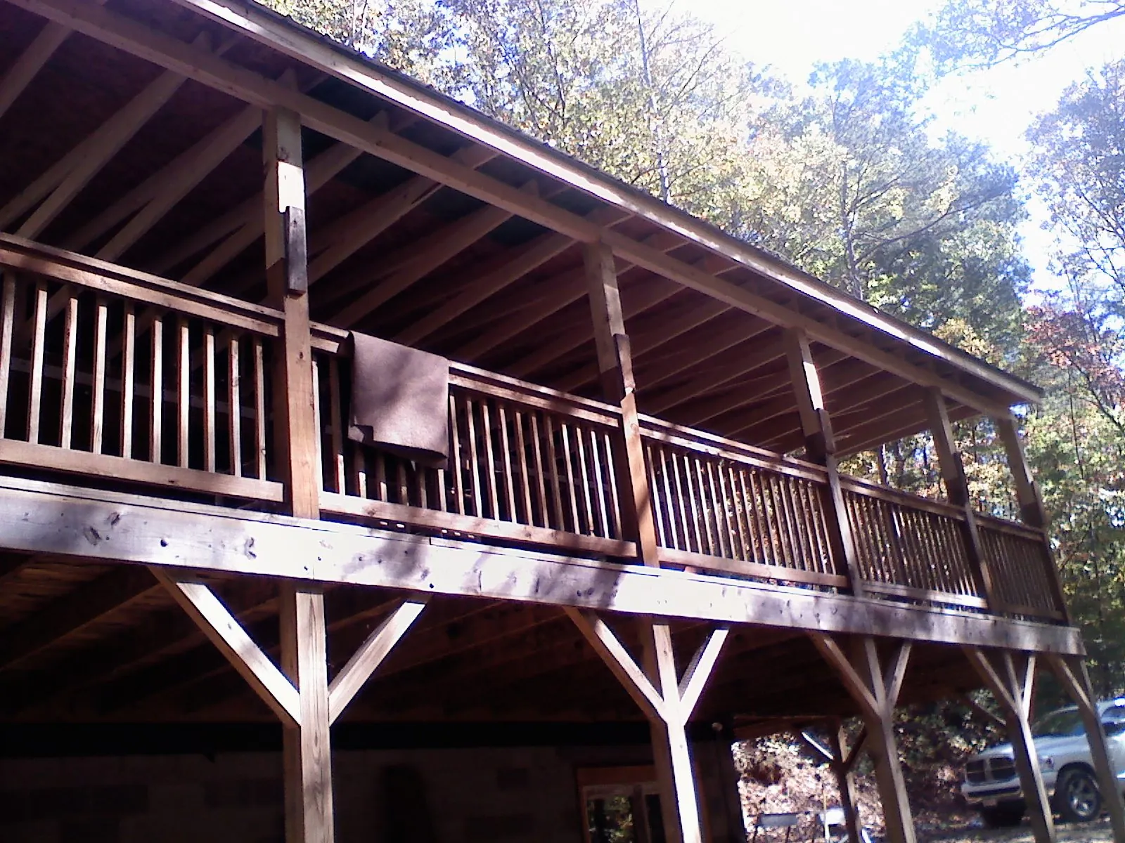 Timber framing under a new elevated porch and deck — Roof Leak Repair in New Sharon by Roofing Brothers